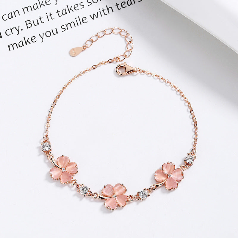 Bracelet en or rose avec pierres précieuses et cristaux