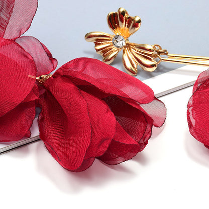 Boucles d’oreilles longues pendantes en forme de fleur