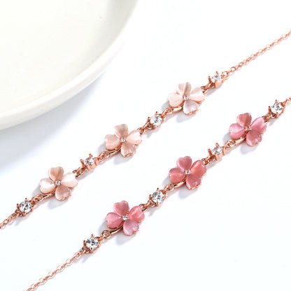 Bracelet en or rose avec pierres précieuses et cristaux